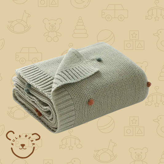 Woolen Baby Blanket with Pom Pom Detail